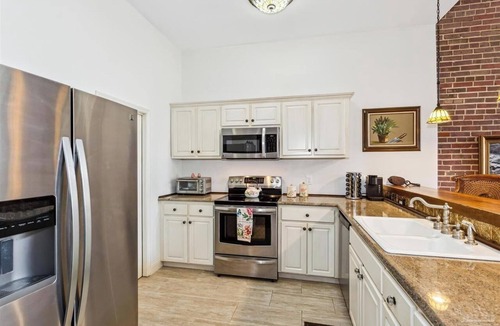 Warrington House | Bring the pup & boat! Historic 2 bedroom, 2.5 bath waterfront town-home w/dock.