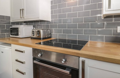 Burniston Cottage | BRINKBURN COTTAGE, pet friendly, with open fire in Burniston