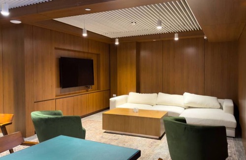 Port Morris Apartment | Bronx Retreat: NYC Apartment w/Movie Theater, Pool, Cinema, Gym & Rooftop Views