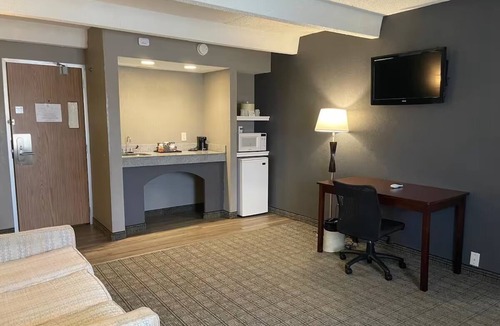 Urbana Hotel | Budget-Friendly King Suite w/Microwave + Refrigerator for Comfort