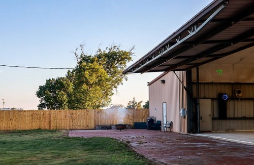 Amarillo House | Buffalo airport Fly Inn. 2 bedroom inside a airplane hangar!