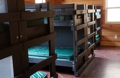 Athens Cabin | Bunk Room 1 / Campbell Cabin. Stay and Play on a Private Campground!