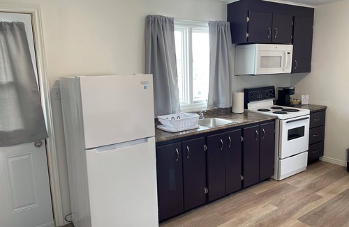 Rocky Harbour Cabin | Buoy & Arrow Restaurant and Suites