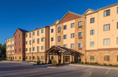 West Omaha Condo | Business-Friendly Stay: Pool & Breakfast