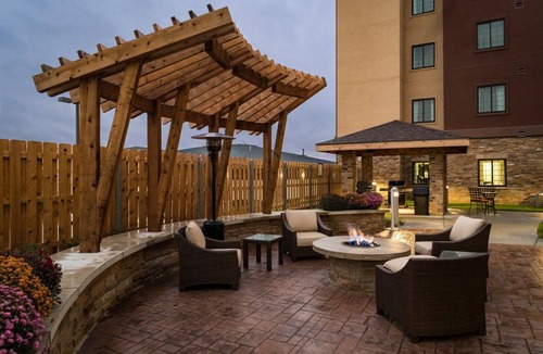 West Omaha Condo | Business-Friendly Stay: Pool & Breakfast