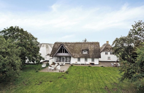 Norre Aby House | By the bay a thatched house lies so beautifully