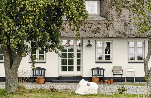 Norre Aby House | By the bay a thatched house lies so beautifully