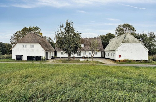 Norre Aby House | By the bay a thatched house lies so beautifully