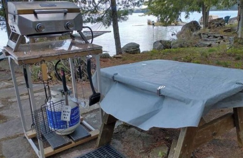 Irondale Apartment | Charming waterfront mini-cottage on peninsula, footsteps to water's edge