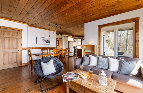 Petite-Riviere-Saint-Francois Ski Chalet | 61B Chalet: Hot Tub, River Views & Wood Accents