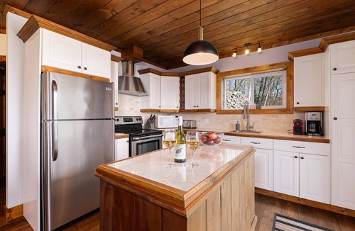 Petite-Riviere-Saint-Francois Ski Chalet | 61B Chalet: Hot Tub, River Views & Wood Accents