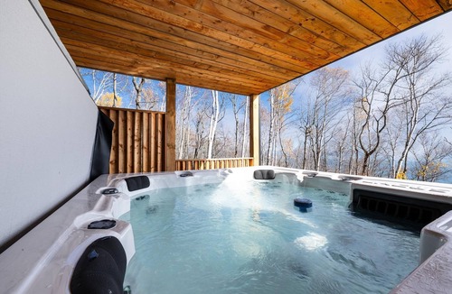 Petite-Riviere-Saint-Francois Ski Chalet | 61B Chalet: Hot Tub, River Views & Wood Accents
