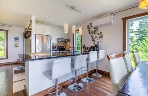 Petite-Riviere-Saint-Francois Condo | 14B Condo: Mountain & River Views, Terrace & BBQ