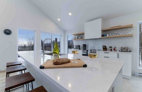 Petite-Riviere-Saint-Francois Ski Chalet | Le Chaleureux 61: River & Mountain Views