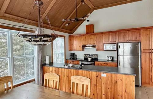 Petite-Riviere-Saint-Francois Condo | Country cottage features impressive views of the St Lawrence River