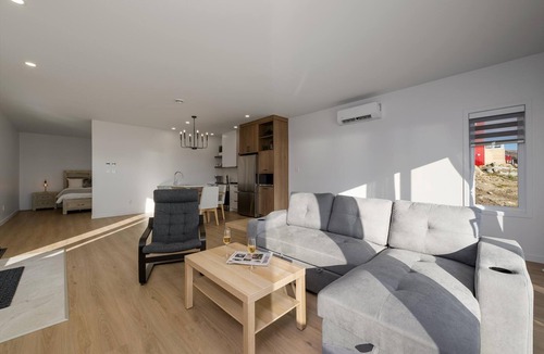 Petite-Riviere-Saint-Francois Condo | Panorama 1249: Majestic River View, Spacious Patio