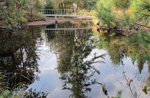 Sainte-Marguerite-du-Lac-Masson House | A Swiss Chalet on Doncaster river + Private Mini Island