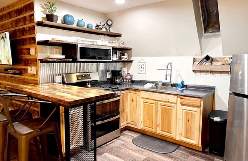 Glenwood Springs Cabin | Cabin 12 Remodeled Rustic Luxury Kitchen Fireplace