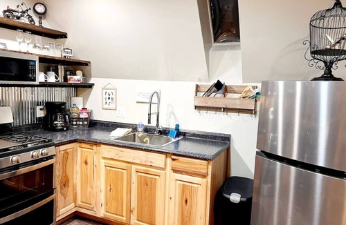 Glenwood Springs Cabin | Cabin 12 Remodeled Rustic Luxury Kitchen Fireplace