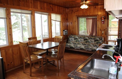 Deer River Apartment | Cabin 6 - Classic cabin with a dockside deck
