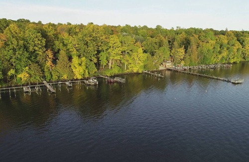 Deer River Apartment | Cabin 6 - Classic cabin with a dockside deck