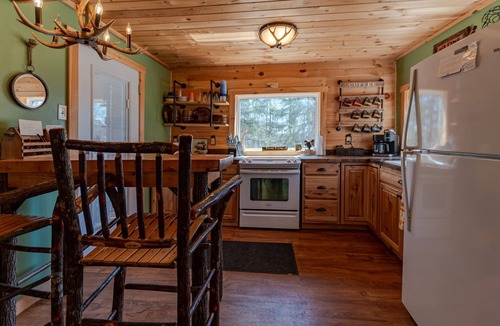 Town of Webb Cabin | Cabin close to town, snowmobile access, parking & hot tub