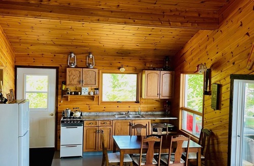 Falcon Lake Cabin | Cabin with large screened deck, on Lake of the Woods in Wiley Bay.