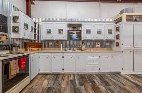 Butte La Rose House | Cajun rustic industrial studio style