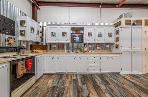 Butte La Rose House | Cajun rustic industrial studio style
