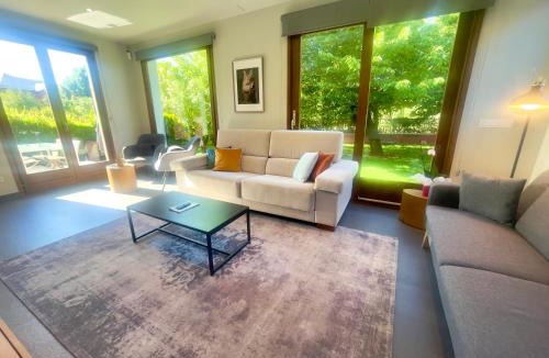 Puigcerda Villa | CAL QuEROL Llac, Villa con jacuzzi y jardín en Puigcerdà centro