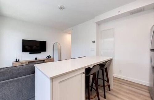 Bow Riverfront Apartment | Calgary Tower Views | UG Park | Rooftop Patio