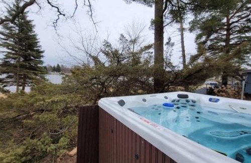Alto House | Campau Lake hot tub, boat, kayak