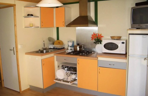 Salles-Curan Ski Chalet | Campsite Beau-Rivage * - Chalet PANORAMIC "VUE LAC" (covered terrace + dishwasher) 4 to 5 people - 4 pers. included in the tariff