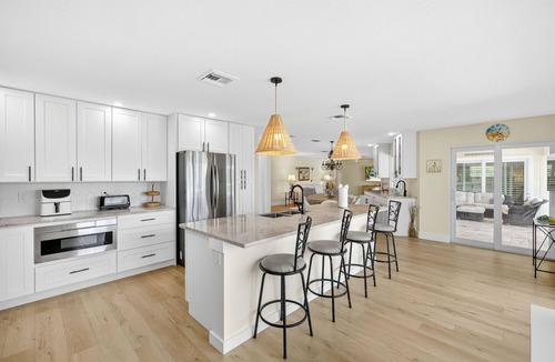 Shell Harbor House | Canal front beauty! NEW