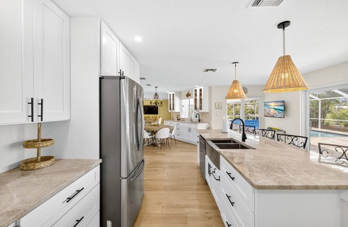 Shell Harbor House | Canal front beauty! NEW