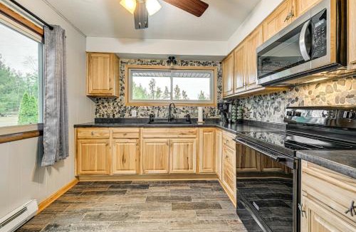 New Lisbon House | Canal-Front Cabin Dock and Fire Pit in New Lisbon