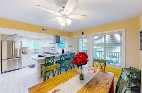 Key Colony Beach House | Canal-front home with Cabana Club access, water view, & private W/D