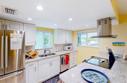 Key Colony Beach House | Canal-front home with Cabana Club access, water view, & private W/D