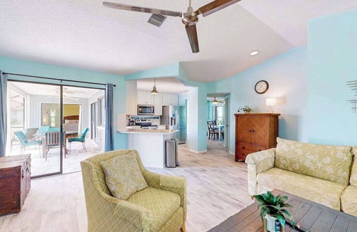 Pebble Beach House | Canal-front home with private pool, grill, patio, AC, W/D & gorgeous views