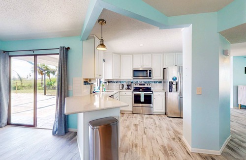 Pebble Beach House | Canal-front home with private pool, grill, patio, AC, W/D & gorgeous views