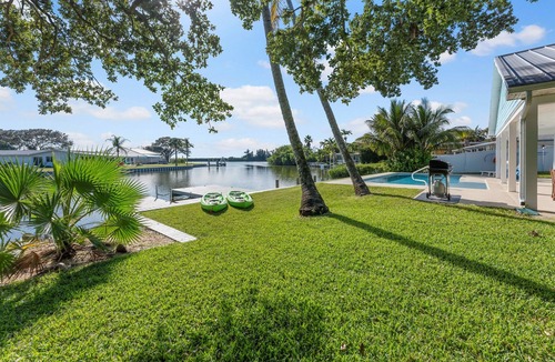 Cocoa Isles House | Canal-Front Home with Heated Pool