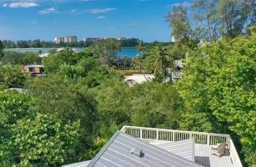 Bay Isle House | Canal-front home with a dock, GULF VIEWS, Shell Beach access.