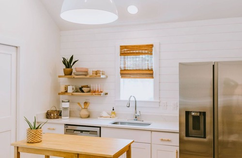 Southern Shores House | Canal front, Modern Tiny House! Bikes. Fire pit!