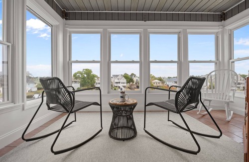 Colington Harbour House | Canal-Front OBX Home w/Dock + Hot Tub/Kayaks/Paddleboards + Bring Your Boat!
