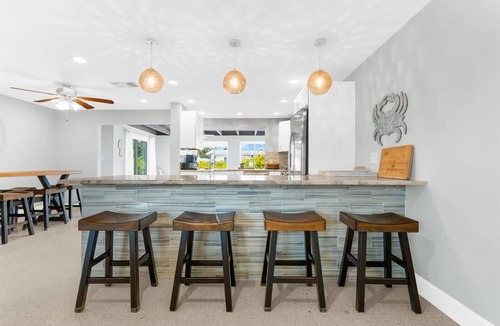 Siesta Key Village House | Canal home short walk to Beach & Village, Heated Pool-Jacuzzi, Private courtyard
