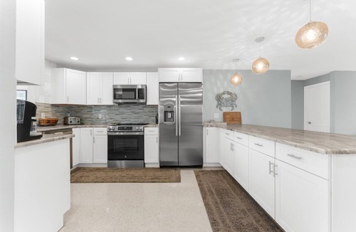 Siesta Key Village House | Canal home short walk to Beach & Village, Heated Pool-Jacuzzi, Private courtyard