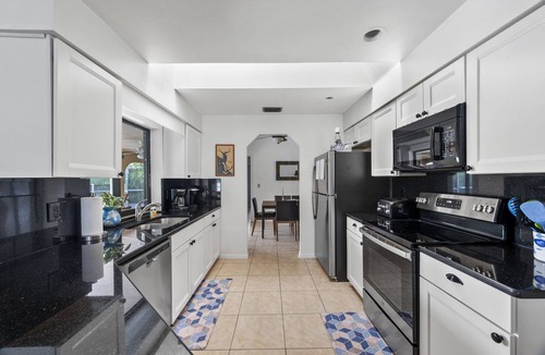 Port Charlotte House | CANAL HOME! WARM PRIVATE POOL! FAMILY MEMORIES! WIFI! GRILL! BABY SUPPLIES!