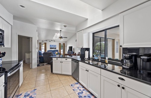 Port Charlotte House | CANAL HOME! WARM PRIVATE POOL! FAMILY MEMORIES! WIFI! GRILL! BABY SUPPLIES!