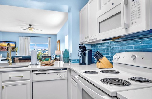 Waterside Village Condo | Canal View Condo | Walk to Beach | Pool & Hot Tub