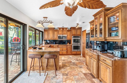 Cocoa Isles House | CanalFront | Heated Pool + Game Room w/Pool Table